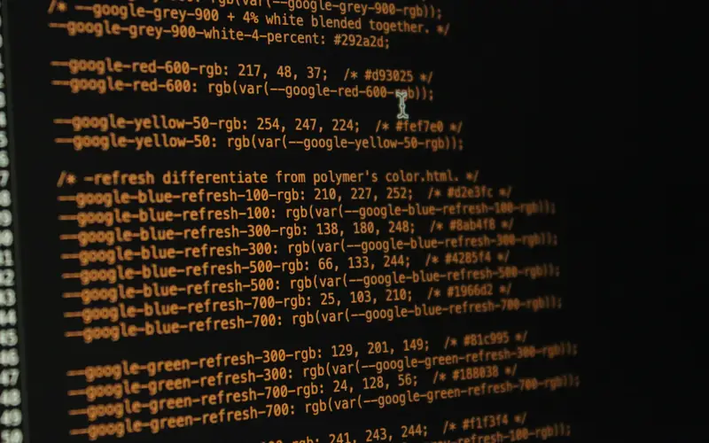 Amber-coloured source code on a dark screen